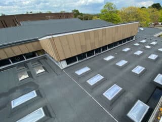 Corfe Hills, roofing refurbishment, including built-up layered waterproofing system by Garland UK
