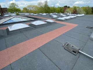Corfe Hills StressPly Flex roof, with detailed workmanship around the rooflight penetrations