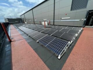 Solar panels installed on roof membrane system