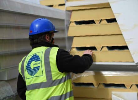 Garland UK Technical Manager inspective composite roof panel with PIR insulation