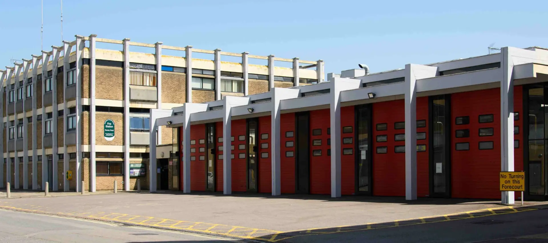 Roofing Resilience: Long-Term Savings for Blue Light Estates Fire station with flat roof