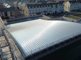 Garland UK storm-resilient metal roofing protecting leisure centre in Rhyl