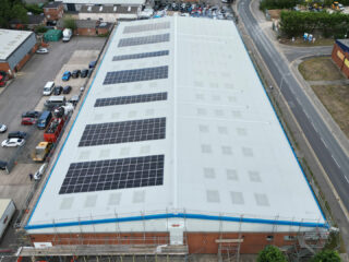 Completed refurbishment of Hambridge Industrial Estate featuring Garland UK’s R-MER CLAD metal roofing system with fully integrated Solarise PV arrays.
