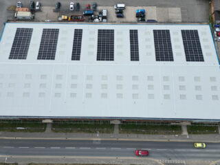 Top-down view of the completed Garland UK roofing system with full Solarise PV installation, highlighting precision in layout and long-term energy performance.