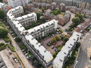 Riverside Mansions, viewed from the air, highlighting the transformation to the roof following the liquid waterproofing system, Dura-Coat application