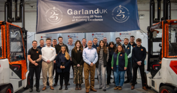 Company photo of head office staff at HGarland UK, celebrating the company 25 year anniversary.
