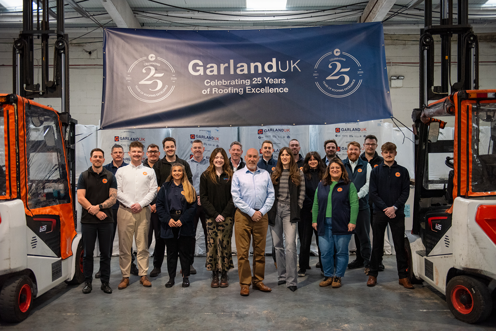 Company photo of head office staff at HGarland UK, celebrating the company 25 year anniversary.