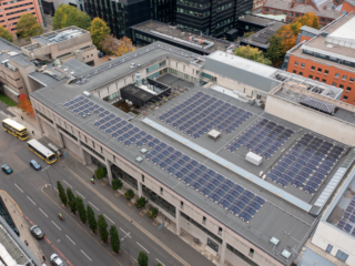Aerial image of the RNCM in Manchester, showcasing the roof refurbishment by Garland UK, supporting the college's goal to decarbonise the estate