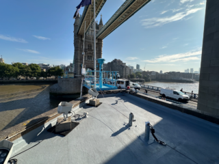 Garland UK completed roof refurbishment at Tower Bridge ticket office using Dura-Coat cold-applied liquid system with heritage-matched detailing.