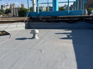 External view of Garland UK completed roof refurbishment project at Tower Bridge with seamless Dura-Coat liquid waterproofing finish