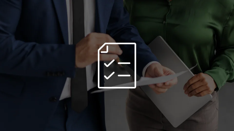 Two professionals reviewing CPD certification document with checklist icon overlay