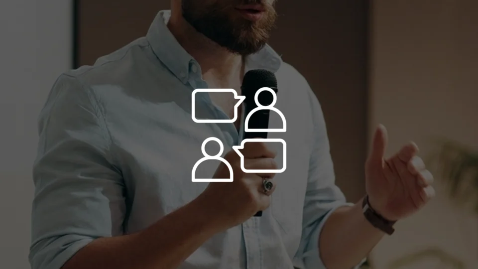 Man speaking into microphone with communication and dialogue icons overlay
