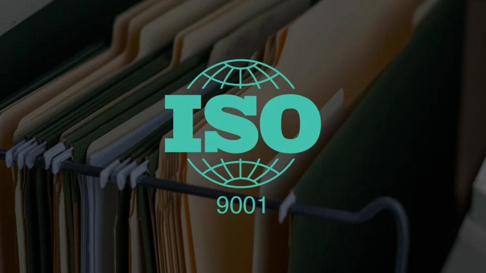 ISO 9001 certification logo with globe symbol on fabric background