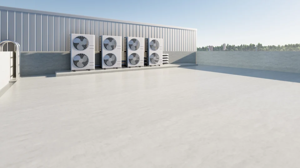 Industrial HVAC units mounted on modern commercial building rooftop