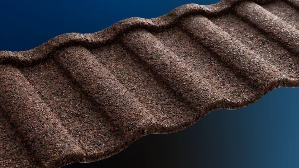 Textured stone tile surface with wavy relief pattern against blue background