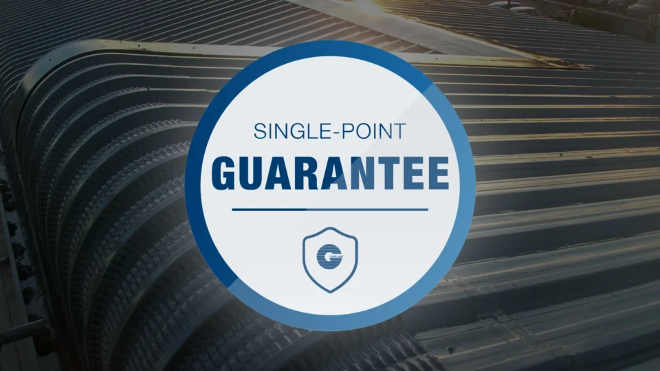 Single-point guarantee badge with shield icon on industrial background