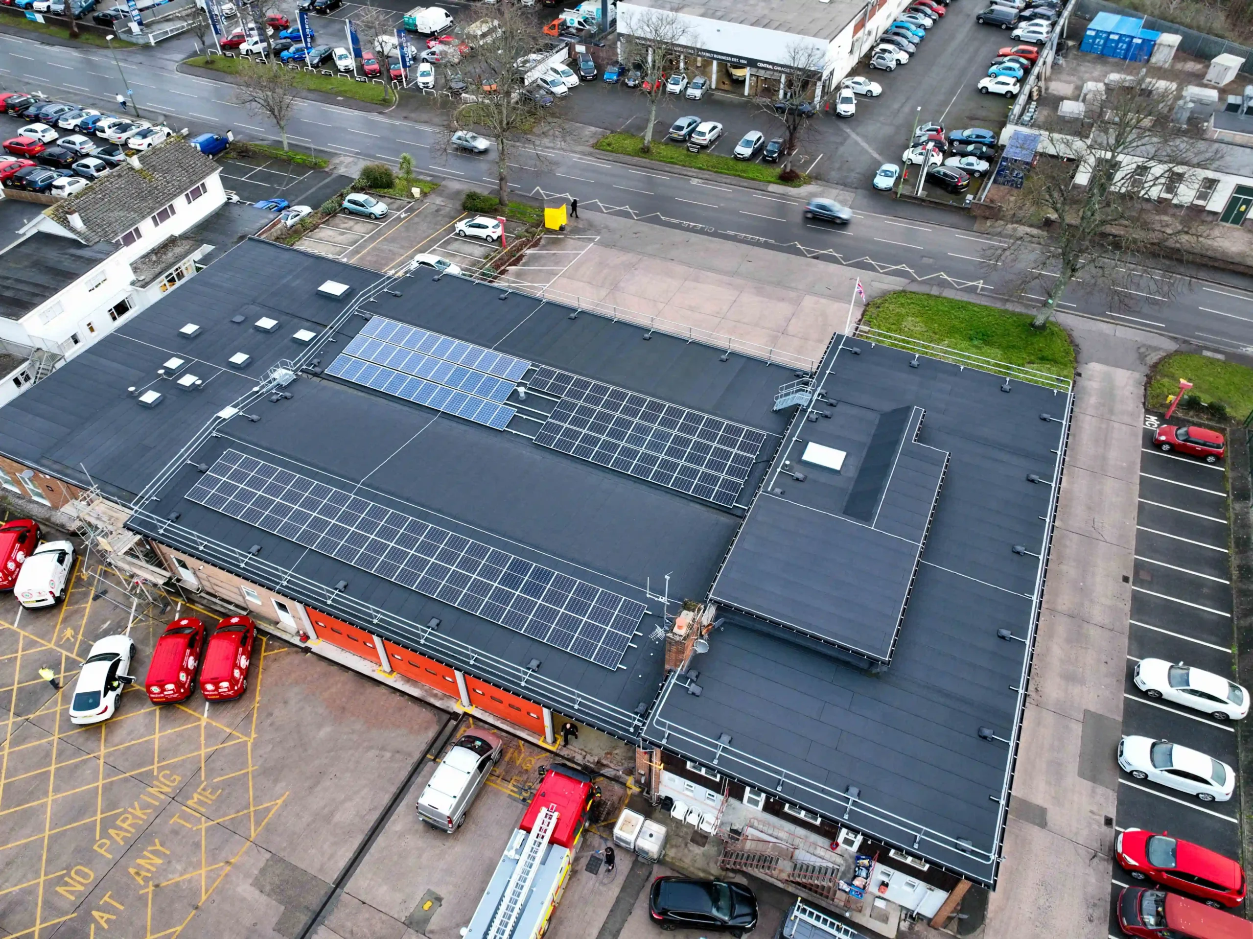 Aerial view of fire station roof with solar panels installed